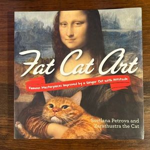 Never used fat cat art coffee table book.